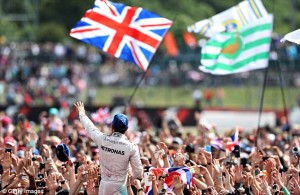 3621BC6300000578-0-Hamilton_waves_and_blows_kisses_to_the_Silverstone_crowd_having_-a-5_1468177955141