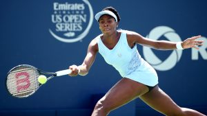 MONTREAL, QC - AUGUST 09: Venus Williams of the USA returns a shot to Serena Williams of the USA during the women's semifinals match in the Rogers Cup at Uniprix Stadium on August 9, 2014 in Montreal, Canada. (Photo by Streeter Lecka/Getty Images)