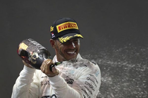 Lewis Hamilton Wins Dramatic Wet-Dry Grand Prix In Singapore, Extends Championship Lead To 28 points.